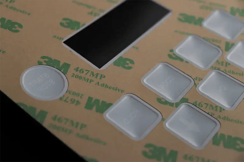 Selective Adhesive on Polycarbonate Overlay
