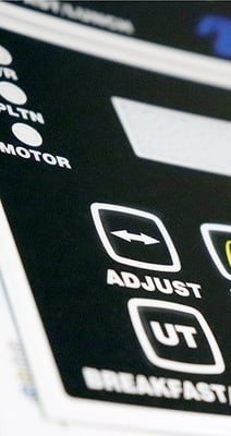 embossed buttons on polycarbonate overlay