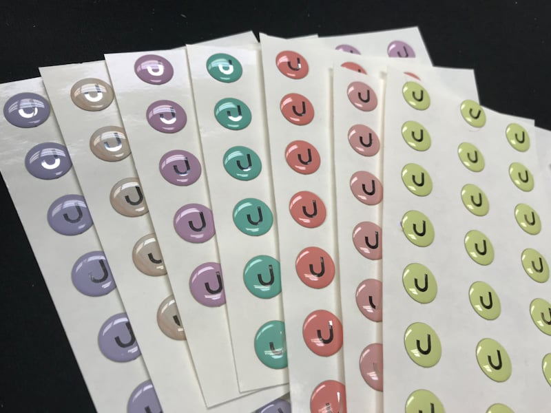 Colorful Brand Labels Enhanced with Doming